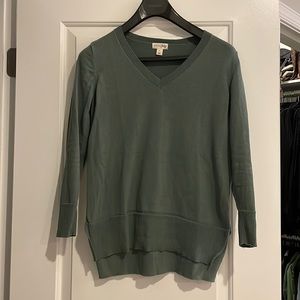 Green v-neck sweater